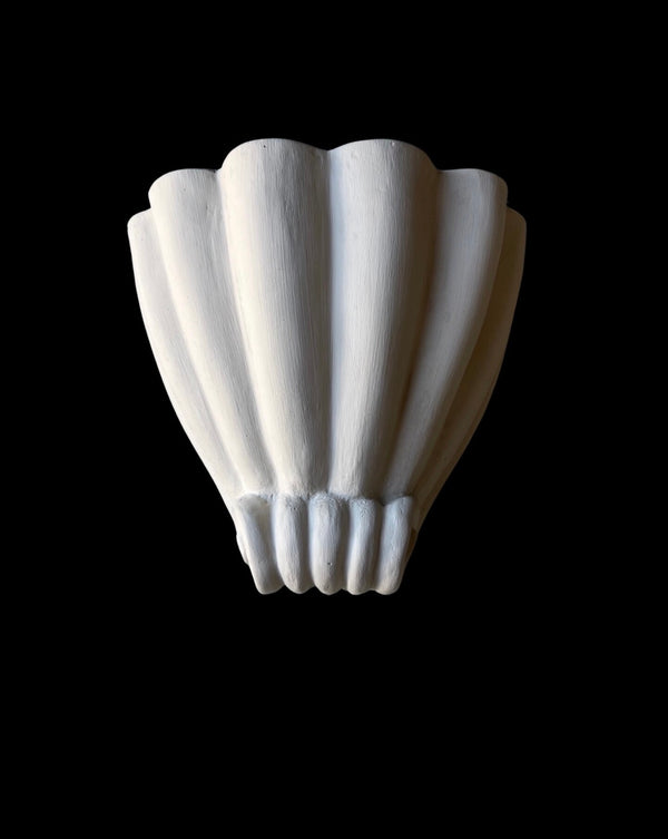 Shell wall lamps in plaster