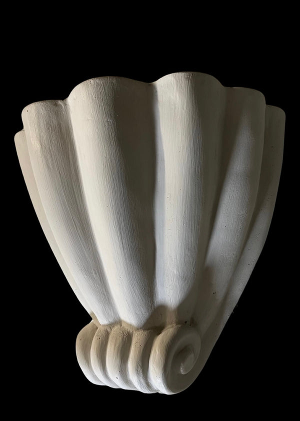 Shell wall lamps in plaster