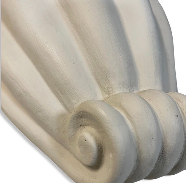 Shell wall lamps in plaster