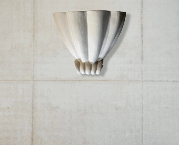 Shell wall lamps in plaster