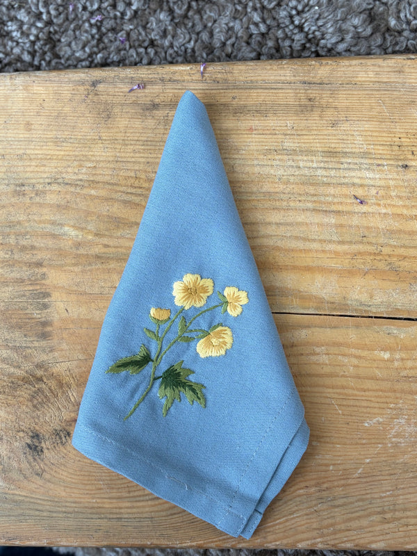 Serviett blå, smørblomst