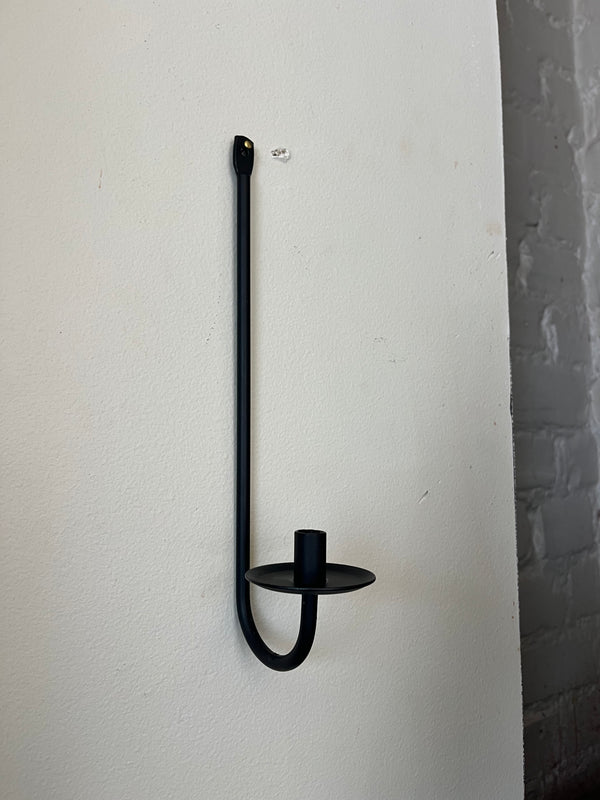 The slender taper candle wall scone