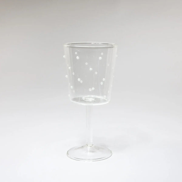 Wine glas with small white dots